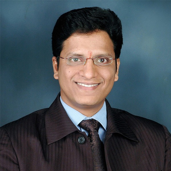 Portrait of CEO Mr. K. Purushothama Adiga